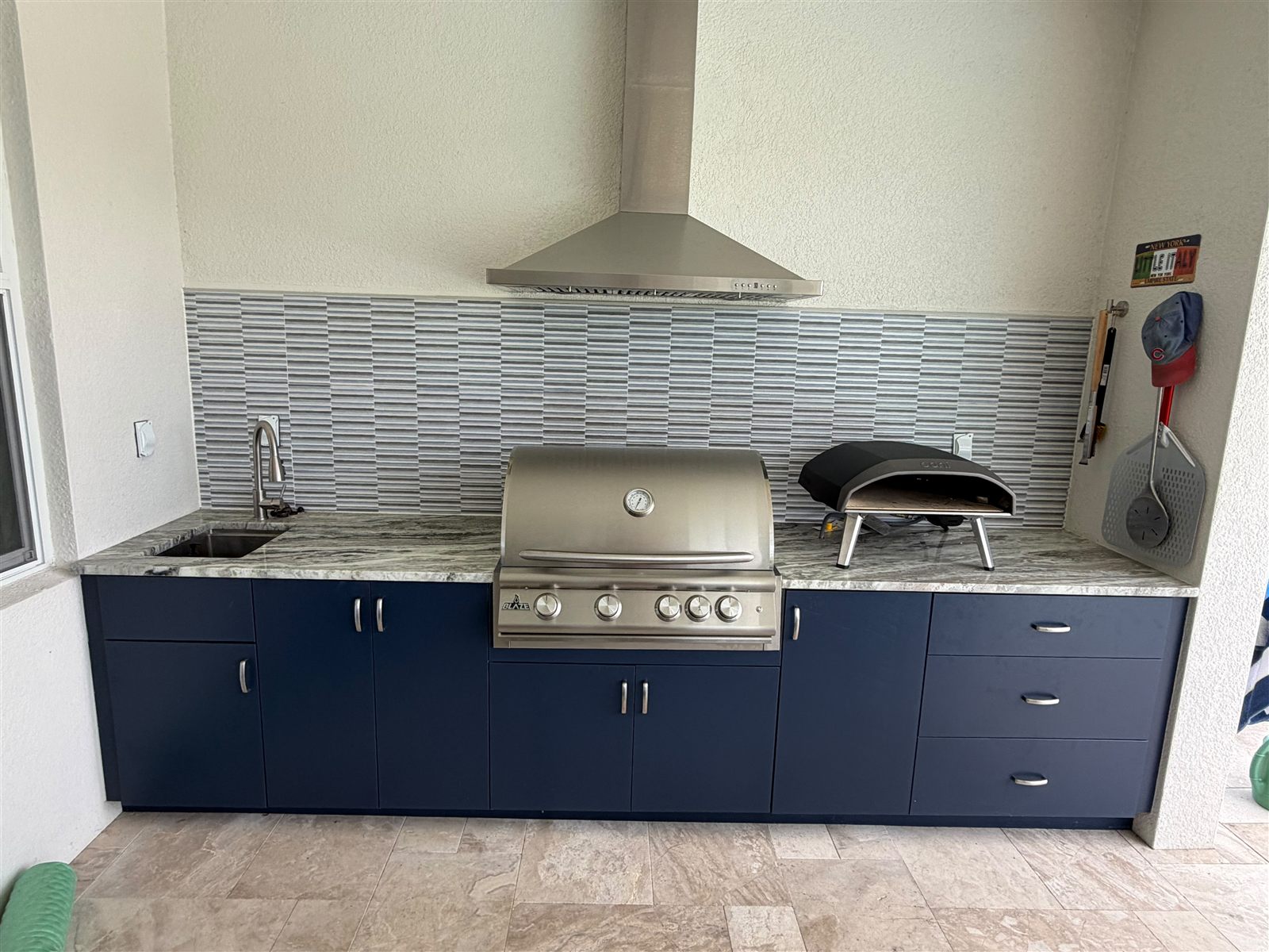 Installed outdoor kitchen cabinets by Bespoke Cabinets and Doors